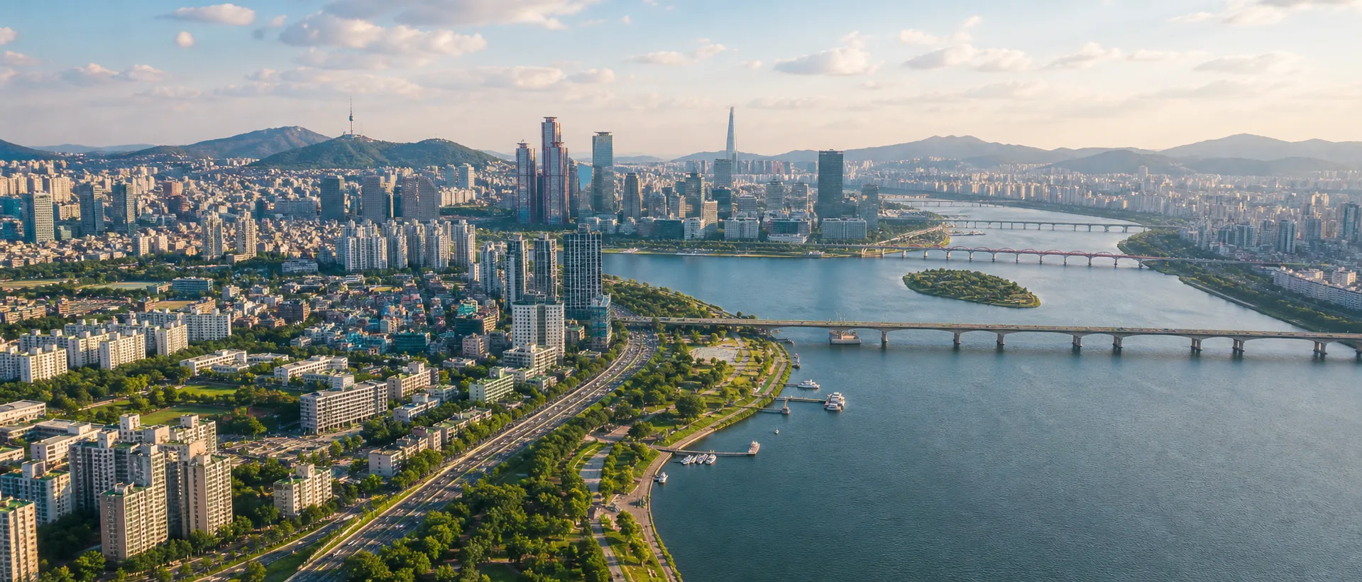 Daytime aerial view of Seoul with the Han River and downtown skyline
